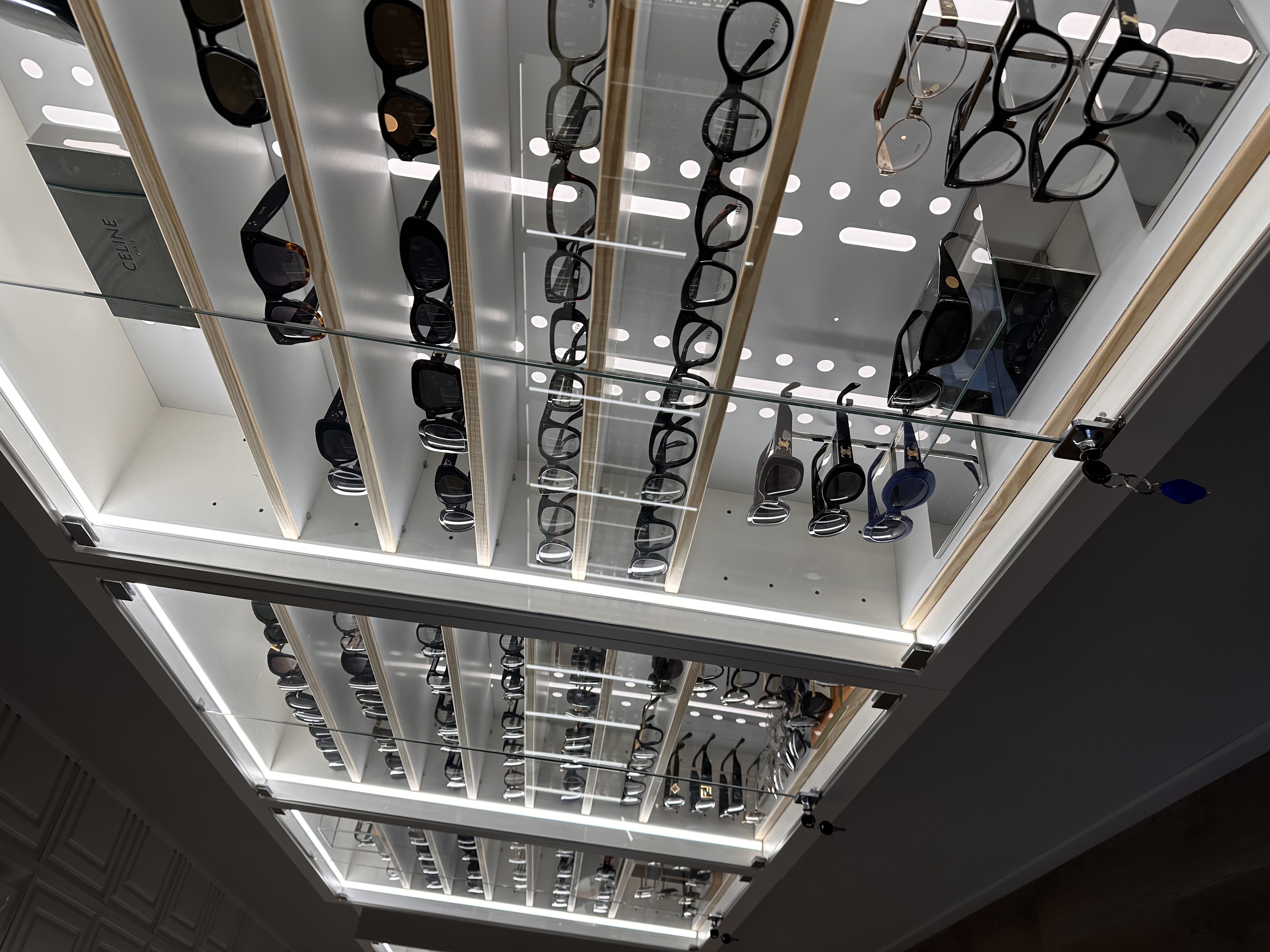 Eye Atelier showroom — white-oak displays and considered lighting in Old Bridge, NJ